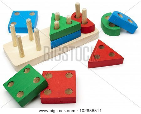 wooden different forms puzzle isolated on white