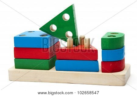 wooden different forms puzzle isolated on white