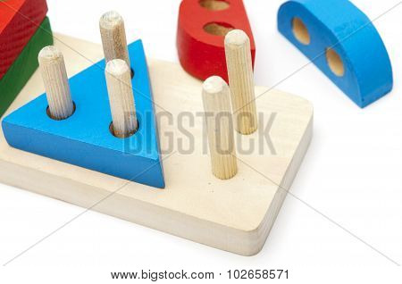wooden different forms puzzle isolated on white