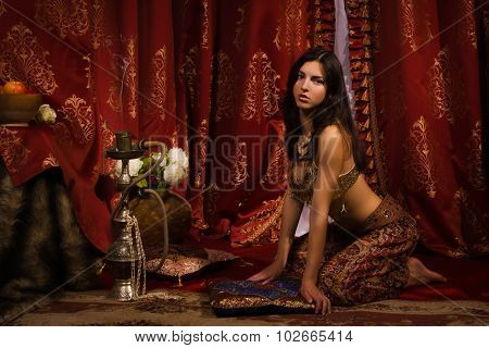 Oriental Woman In A Traditional Costume