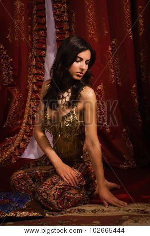 Oriental Woman In A Traditional Costume