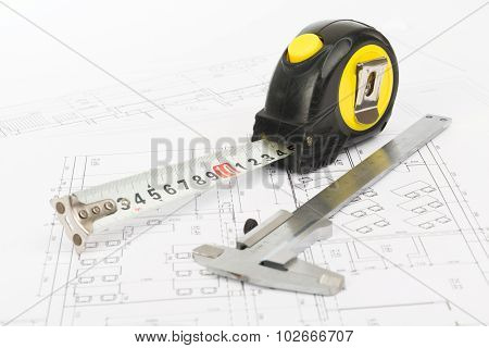 Tape measure with beam-compass, close up view