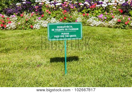 Notice Board On The Lawn With Text 