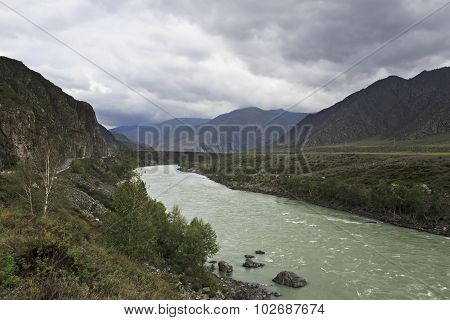 Storm clouds over Chuysky Trakt and river Katun.