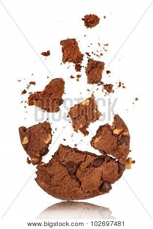 Bitten Into Chocolate Chip Cookie With Crumbs On White