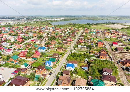 Aerial view of houses on housing estates. Tyumen