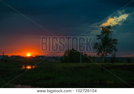 Sunset over calm lake