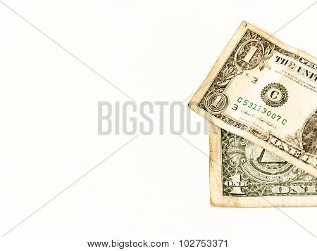 Two Usa Dollars Lay Over White