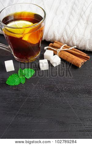 A Cup Of Black Tea With Lemon And Cinnamon