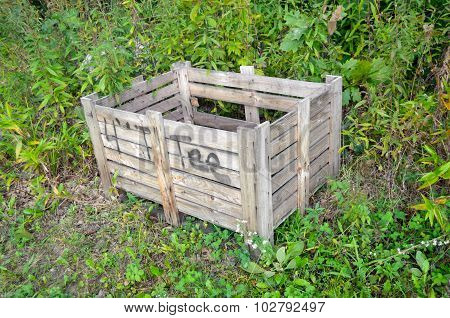 Wooden crate out in the woods for compost