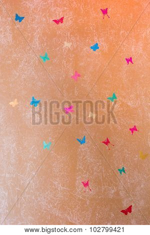 Beige Wall Painted With Textured Paint Roller With Butterflies