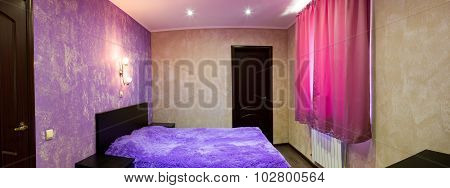 Bed In Bedroom In Shades Of Lilac