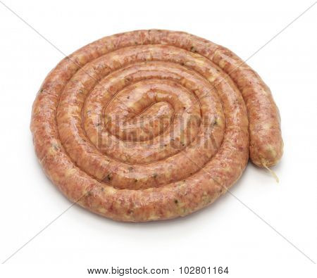 raw cumberland sausage, spiral pork sausage isolated on white background