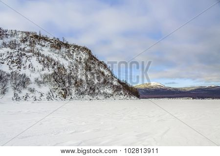 Winter seascape with rock
