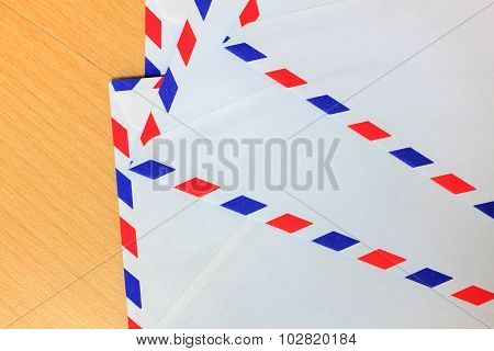Envelope On Wood Background.