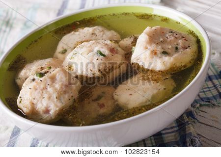 Bread Dumplings In A Broth Close Up. Horizontal