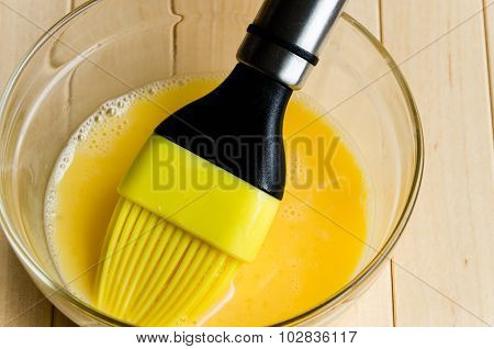 Mixed eggs in glass bowl