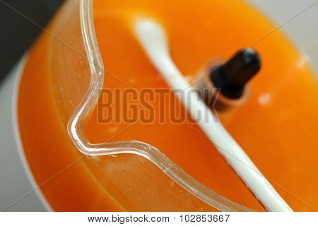 Fresh Orange Juice In Juicer Machine With Hand