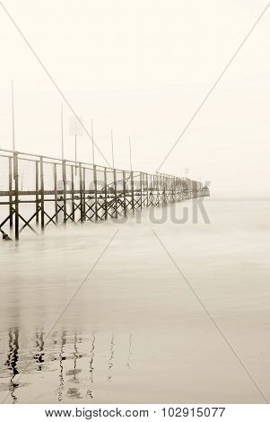 Dock Shrouded By The Fog