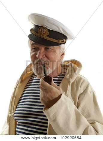 Captain. Sailor man in marina port with boats background 