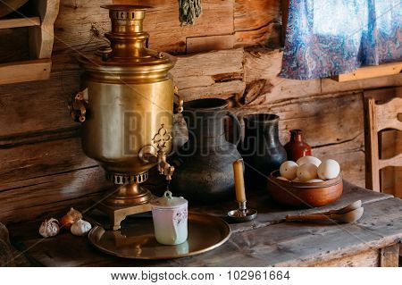 Interior of kitchen room in russian traditional wooden house