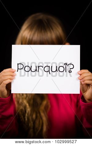 Child Holding Sign With French Word Pourquoi - Why