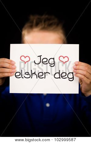 Child Holding Sign With Norwegian Words Jeg Elsker Dig - I Love You