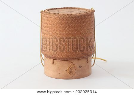 bamboo container for holding cooked glutinous rice.