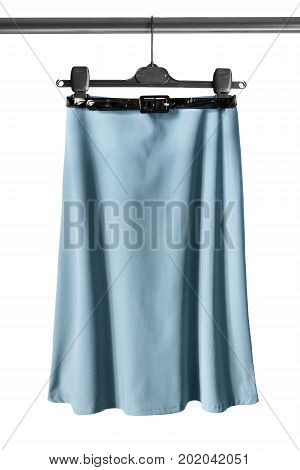 Elegant basic blue midi skirt on clothes rack isolated over white