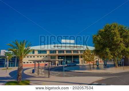 PALMA DE MALLORCA, SPAIN - AUGUST 18 2017: Unidentified people walking in the street near of harbor in Palma de Mallorca, Balearic islands, Spain.