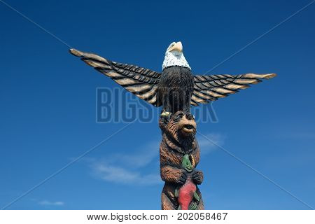 A carved wooden Alaskan Totem pole, Anchorage, Alaska.