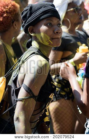 London United Kingdom - August 27 2017. Notting Hill Carnival one of the largest street parties in Europe is now in its 51st year. This year was close to the ruin of Grenfell Tower scene of a devastaing fire.