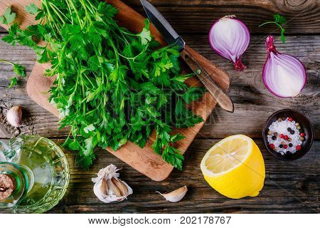 Ingredients For Chimichurri Sauce: Fresh Parsley, Red Onion, Garlic, Olive Oil, Lemon