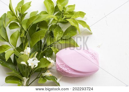 chunk of pink soap fragrance of the flower from nature for health and sanitation skin on white