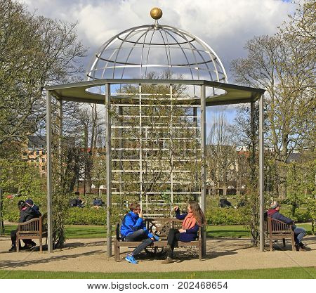 Copenhagen, Denmark - April 24, 2017: people are relaxing in public park of Copenhagen, Denmark