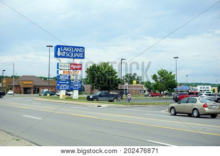 CADILLAC, MICHIGAN / UNITED STATES - JUNE 22, 2017: The Lakeland Square Shopping Center houses Peebles, Dunham Sports, Big Lots!, Sally Beauty Supply, Glik's, the Dollar Tree, the Great Wall Chinese Buffet restaurant, Shoe Sensation, and Bath & Body Works