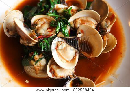 Chinese FoodFried clams with basil in white dishTaiwan