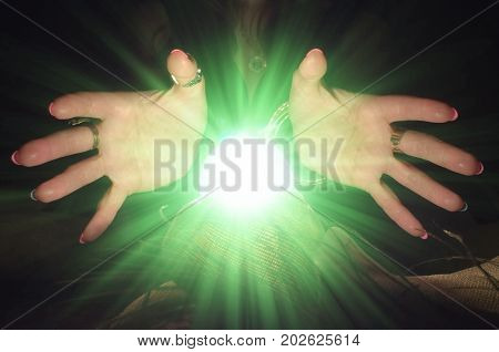 Crystal ball and fortune teller hands. Divination. Seance.