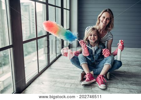 Mom With Daughter Doing Cleaning
