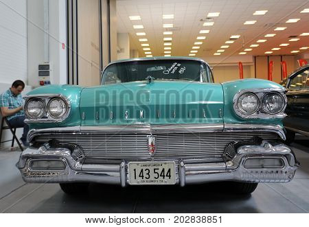 CRACOW POLAND - MAY 20 2017: Oldsmobile Super 88 displayed at MOTO SHOW in Cracow Poland. Exhibitors present most interesting aspects of the automotive industry