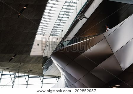 Munich, Germany - August 3, 2017: Interior shot of BMW Welt in Munich. It is a multi-use exhibition center used for meetings and promotional events, and where buyers take delivery of BMW vehicles. Designed by archtectural firm Coop Himmelblau