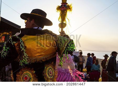 PUNO, PERU - AUGUST 07: Authentic Colorful Carnival on the streets of Puno, Peru near the high altutude Titicaca lake on August 7th, 2017