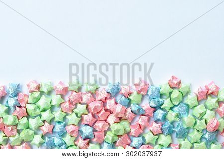 Colorful Star Paper Arraigning Line With Copy Space On White Background