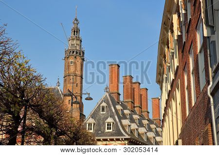 Traditional Houses On Grote Markt Square With The Tower Of The Town Hall (stadhuis) On The Left, Gro