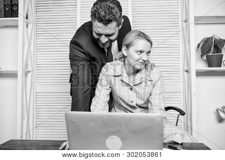 Create Greater Safety And Trust. Sexual Harassment At Work. Man And Woman Colleagues Flirt In Office