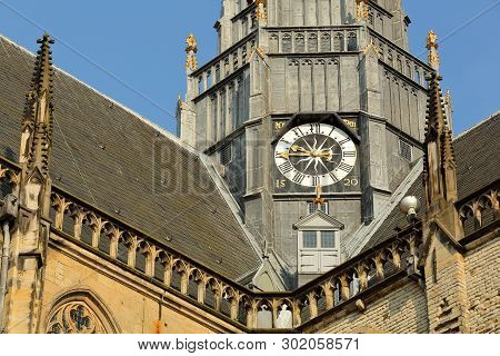 Close-up On The Clock Tower Of St Bavokerk Church In Haarlem, Netherlands