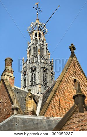 Close-up On The Clock Tower Of St Bavokerk Church In Haarlem, Netherlands