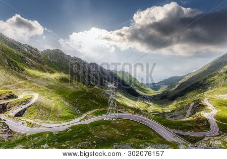 Awesome Sunny Landscepe In Romania Mountains. Scenic Image Fairytale Valley With Asphhalt Road, And 
