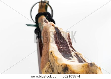Spanish Delicatessen Dry Cured Meat Ham, Whole Leg, Jamon Iberico Bellota On Jamonero Stand Selectiv