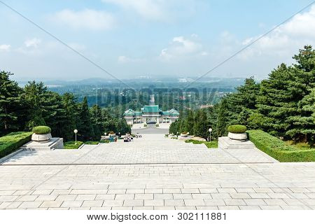 Pyongyang, North Korea-july 27, 2014: Korean Schoolchildren Climb The Stairs At The Memorial Cemeter